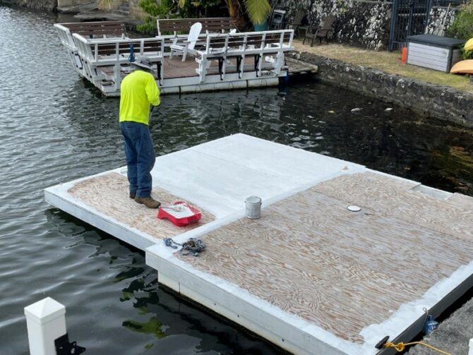 Sean paints the new work float